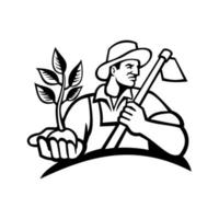 agriculteur biologique tenant une plante et tenant une mascotte de houe en noir et blanc