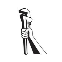 Main de plombier tenant une clé à pipe rétro noir et blanc vecteur