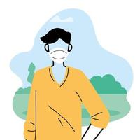 jeune homme portant un masque facial pour prévenir le virus dans le parc vecteur