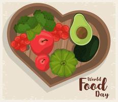 affiche de la journée mondiale de lalimentation avec des légumes sur un coeur en bois vecteur