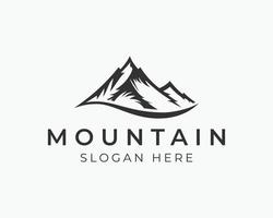 création de logo de montagne. logo vectoriel de silhouette de montagne