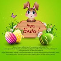 mignonne Pâques lapin avec une en bois signe et coloré des œufs sur vert Contexte vecteur