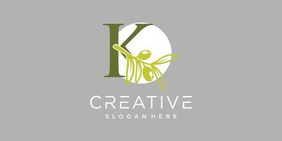 lettre logo k avec olive branches illustration de vert feuilles prime vecteur