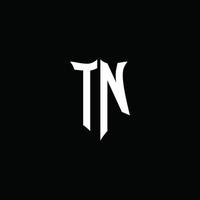 ruban de logo de lettre monogramme tn avec style de bouclier isolé sur fond noir vecteur