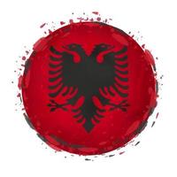 rond grunge drapeau de Albanie avec éclaboussures dans drapeau couleur. vecteur