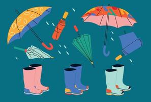 ensemble de caoutchouc bottes et parapluies. vecteur illustration.