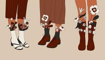 ensemble de Trois femelle jambes dans bottes. cool chaussure avec fleurs. haute chaussettes . main tiré vecteur coloré branché mode illustration. plat conception