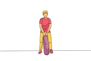 dessin en ligne continue unique d'un jeune skateur cool tenant un skate et pose stylé pour montrer une chemise de vêtements dans un parc de skate. concept de sports de plein air. illustration vectorielle de conception de dessin à une ligne à la mode vecteur