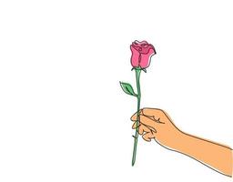 un dessin au trait continu de main tenant une belle fleur rose fraîche romantique. carte de voeux moderne, invitation, logo, bannière, concept d'affiche graphique à ligne unique dessiner illustration vectorielle vecteur