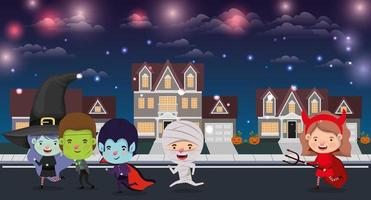 scène d & # 39; halloween avec des enfants en costumes dans le quartier