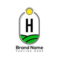 agriculture modèle sur h lettre. les terres agricoles logo, agro cultiver, éco ferme logo conception avec Soleil icône concept vecteur