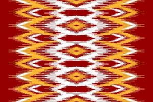 bel art de motif tribal ethnique. modèle sans couture rouge ikat ethnique. style américain et mexicain. vecteur