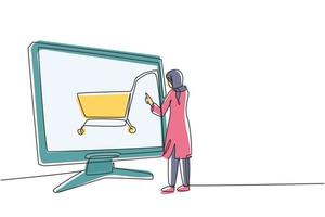 dessin d'une seule ligne continue jeune femme arabe faisant du shopping à travers l'écran du moniteur avec panier d'achat. commerce électronique, concept de style de vie numérique. Une ligne dynamique dessiner illustration vectorielle de conception graphique vecteur