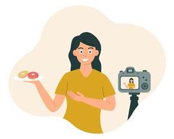 blogueuse culinaire une femme sourit et montre de la nourriture devant la caméra tout en enregistrant une vidéo, une photo. vecteur