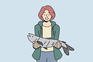 souriant femme en portant poisson dans mains excité avec réussi pêche. content femelle pêcheur avec transporter. loisir et divertissement. vecteur illustration.