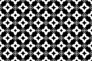 sans couture batik motif, géométrique tribal motif, il ressemble ethnique bohème, aztèque style, ikat style.luxe décoratif en tissu noir et blanc sans couture modèle pour célèbre bannières. vecteur