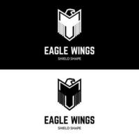 Aigle dans bouclier forme aile logo conception icône vecteur