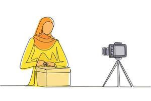 dessin d'une seule ligne beauté spectacle féminin arabe unboxing paquet reçu en direct à la maison. femme vlogger produit de déballage, enregistrement de la critique sur caméra. ligne continue dessiner illustration vectorielle de conception vecteur