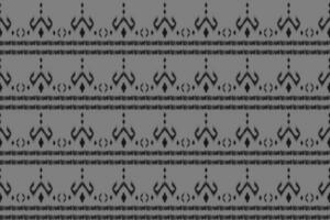 motif gris ethnique ikat art. ethnique sans couture modèle. aztèque géométrique art ornement imprimer. Américain, mexicain style. vecteur