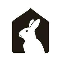 élégant lapin maison logo sur noir et blanc vecteur