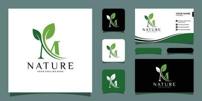 initiale lettre m avec feuille luxe logo. vert feuille logo avec affaires carte conception prime vecteur