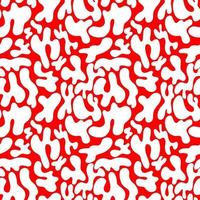 motif abstrait de taches blanches sur fond rouge. un simple motif de taches. cercles, ovales. style abstrait, design pour tissu, textile, papier. illustration vectorielle vecteur