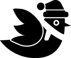 glyphe icône de oiseau portant Père Noël chapeau et foulard. vecteur