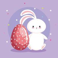 adorable lapin avec un œuf de pâques décoré vecteur