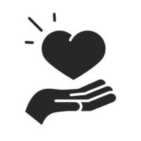 don de charité bénévole aide sociale coeur dans la main icône de style silhouette vecteur