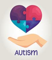 journée mondiale de l'autisme avec la main et le coeur vecteur