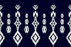 modèle sans couture ikat ethnique en tribal. impression d'ornement ethnique géométrique aztèque. style de motif ikat. conception pour le fond, papier peint, illustration, tissu, vêtements, tapis, textile, batik, broderie. vecteur