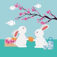 couple de lapins avec branche d & # 39; arbre chinois et fleurs vecteur