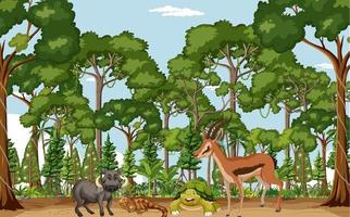 scène de forêt tropicale humide avec divers animaux sauvages vecteur