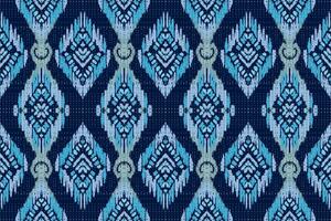 ornement folklorique géométrique ikat. texture vectorielle ethnique tribale. motif rayé sans couture dans le style aztèque. figure broderie tribale. indien, scandinave, gyp sy, mexicain, folk pattern.ikat pattern vecteur