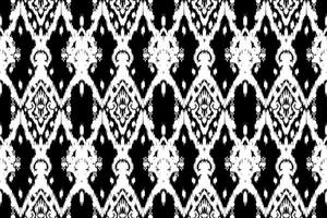 ornement folklorique géométrique ikat. texture vectorielle ethnique tribale. motif rayé sans couture dans le style aztèque. figure broderie tribale. indien, scandinave, gyp sy, mexicain, folk pattern.ikat pattern vecteur