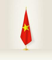 vietnam drapeau sur une drapeau rester. vecteur