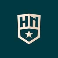 initiale hn logo étoile bouclier symbole avec Facile conception vecteur