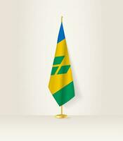 Saint Vincent et le grenadines drapeau sur une drapeau rester. vecteur