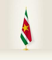 suriname drapeau sur une drapeau rester. vecteur