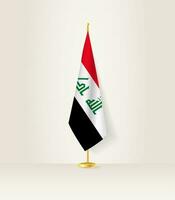 Irak drapeau sur une drapeau rester. vecteur