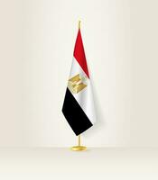 Egypte drapeau sur une drapeau rester. vecteur