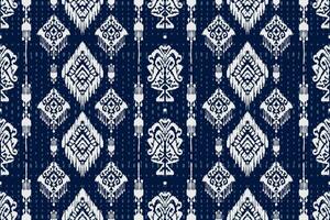 ornement folklorique géométrique ikat. texture vectorielle ethnique tribale. motif rayé sans couture dans le style aztèque. figure broderie tribale. indien, scandinave, gyp sy, mexicain, folk pattern.ikat pattern vecteur