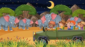 safari de nuit avec de nombreux enfants regardant un groupe d'éléphants vecteur