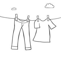 illustration vectorielle de dessin animé de jeans et t-shirt à linge suspendus vecteur