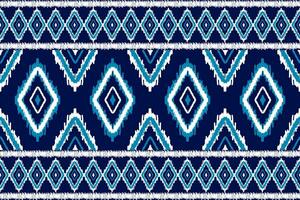 tapis ethnique motif ikat art. motif harmonieux d'ikat ethnique géométrique en tribal. façon mexicaine. vecteur