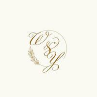 initiales Wyoming mariage monogramme logo avec feuilles et élégant circulaire lignes vecteur