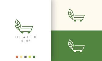 logo chariot pour magasin naturel ou bio dans un style simple et moderne vecteur