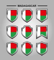 Madagascar nationale emblèmes drapeau avec luxe bouclier vecteur