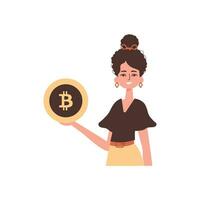 femme en portant bitcoin pièce de monnaie dans sa mains. personnage dans branché style. vecteur
