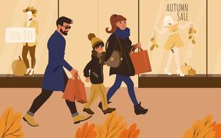 la famille fait ses courses aux soldes d'automne vecteur